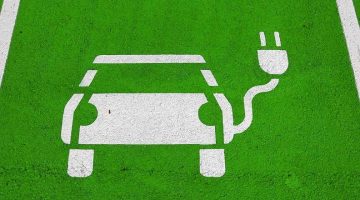 Ilustração de uma vaga para a recarga de um carro elétrico